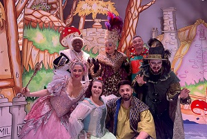 The cast of Jack and the Beanstalk on stage in costume