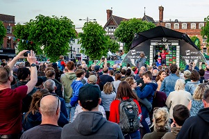 Crowds watch the podium at a round of the 2019 Tour Series